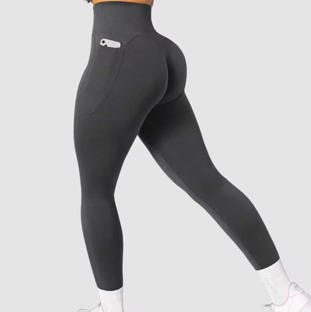 gray balancewise leggings with a logo on a background. leggings with a pocket