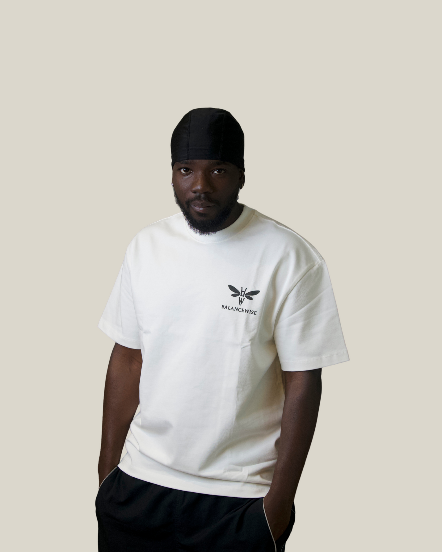 model wearing Liam White T-Shirt front