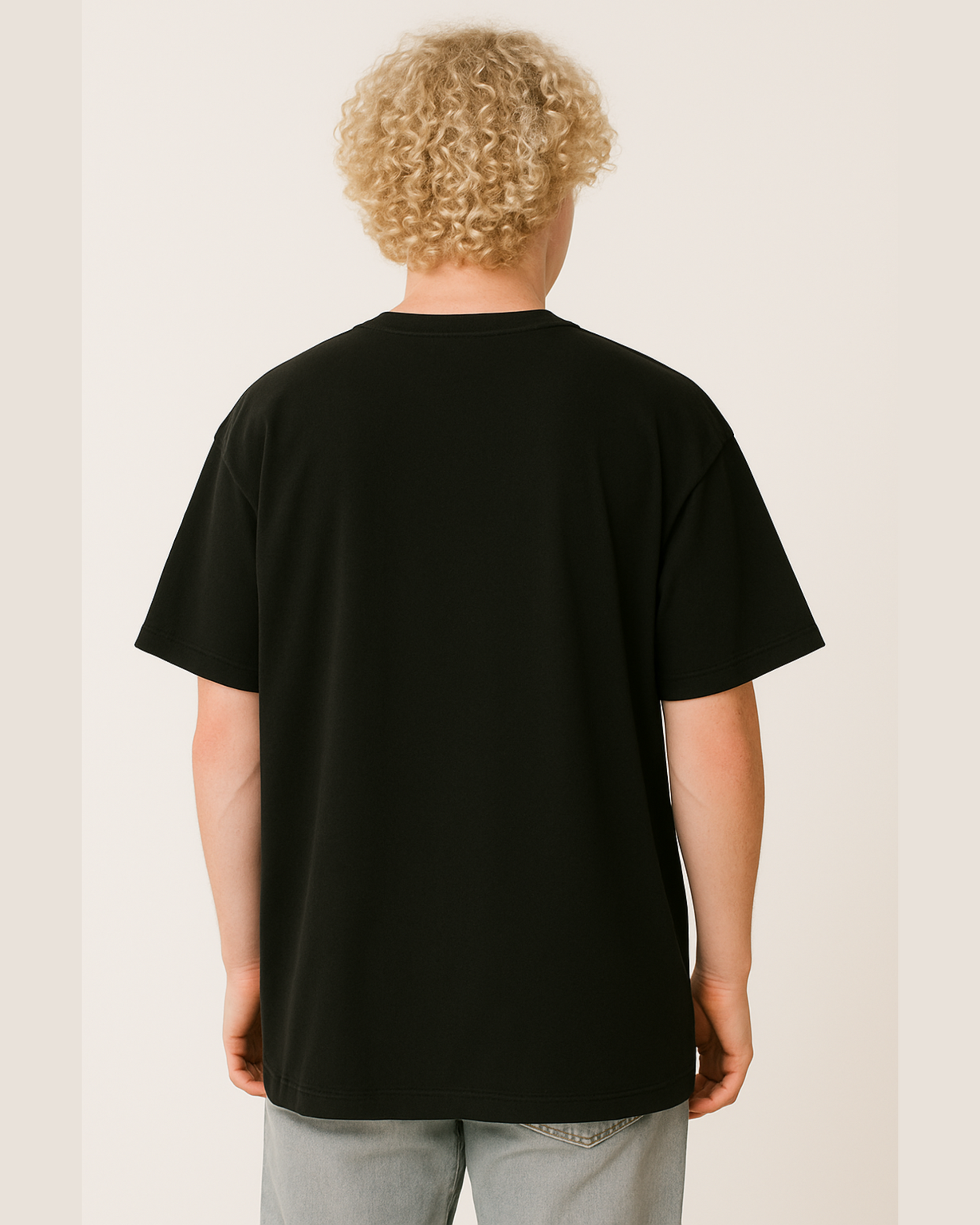 Person wearing a  'BALANCEWISE' black t-shirt on a plain background