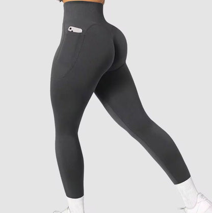 gray balancewise leggings  with a logo on a background.  leggings with a pocket 